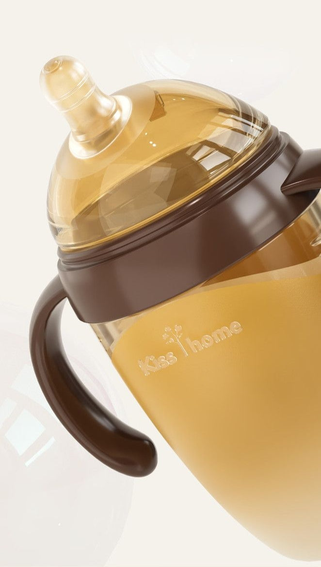 Soft and durable silicone baby bottle with a tilted spout and wide mouth, suitable for infants aged 0-6-12 months.