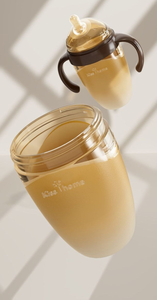 Soft and durable silicone baby bottle with a tilted spout and wide mouth, suitable for infants aged 0-6-12 months.