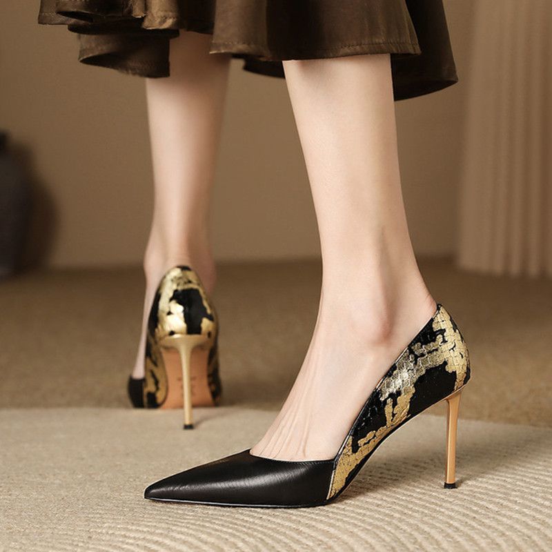 CL elegant and sophisticated women's rhinestone stiletto heels, new black patent leather, pointed toe, and red sole.