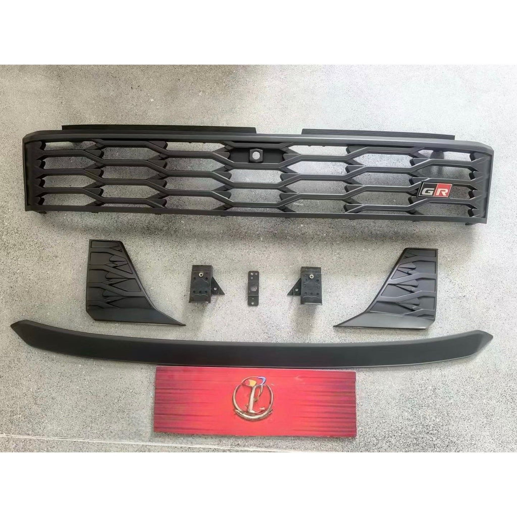 Modified GR emblem front grille and hood trim for 2026 Hilux Travo