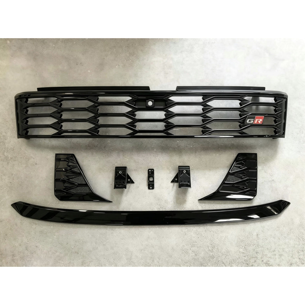 Modified GR emblem front grille and hood trim for 2026 Hilux Travo