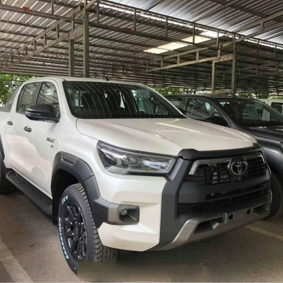 12-25 Hilux body kit for older models, 26 Travo upgraded bumper, grille, and headlights.