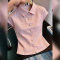 Stylish polka dot short-sleeved navy blue shirt, youthful and chic, perfect for summer 2026 commuting.