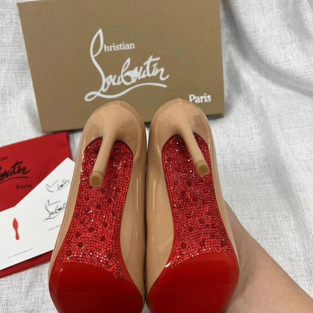CL elegant and sophisticated women's rhinestone stiletto heels, new black patent leather, pointed toe, and red sole.